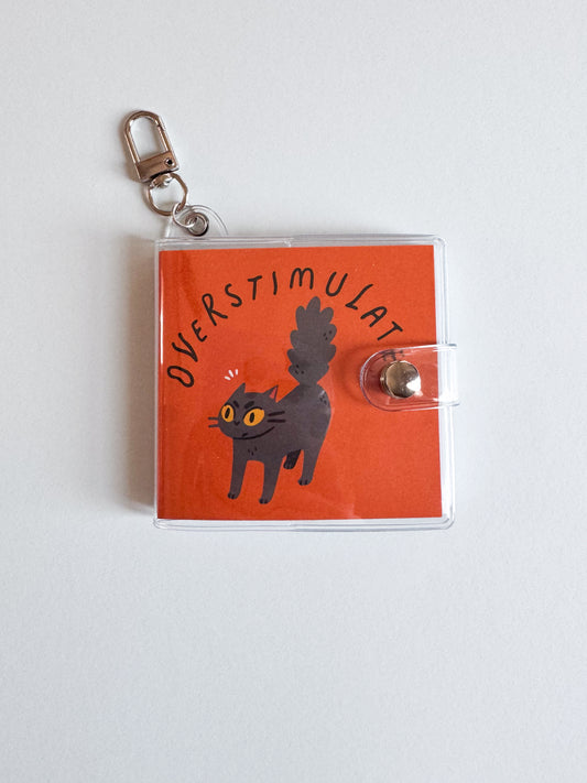 Mini Notebook Bag Charm Keychain - Overstimulated Cat (Funny, Cat, ADHD)